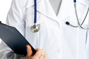 medical doctor with clipboard, isolated on white background