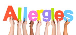 Group of Multiethnic Hands Holding Allergies
