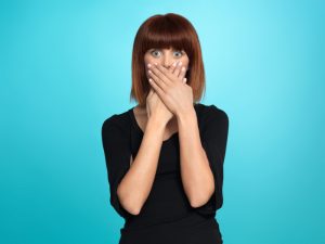 pretty woman with surpised face expression