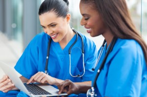 healthcare workers using laptop