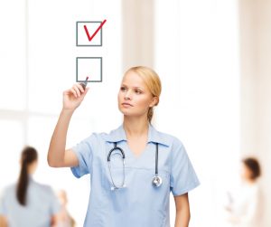 doctor or nurse drawning checkmark into checkbox