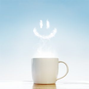 Сoffee cup with smile symbol