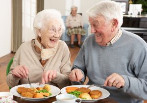 Senior Couple Enjoying Meal Together