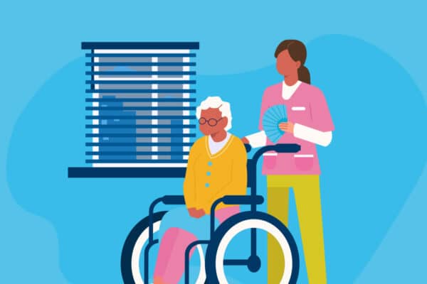 A day with her carer sitting in front of a window with the blinds open