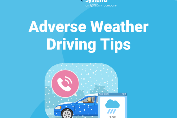 Blue car driving carefully in a snow storm